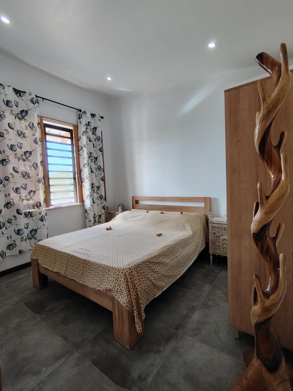 Le P'Tit Bohneur Apartamento Trou aux Biches Exterior foto